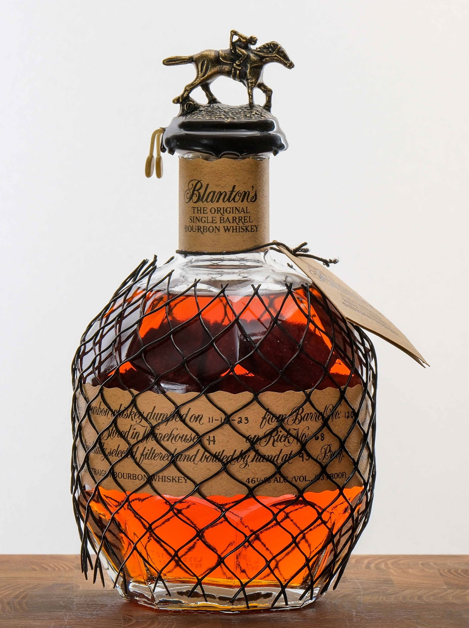 Blanton's Single Barrel Bourbon Whiskey 2023: Dumped on 11-10-23 from Barrel No. 120. Stored in Warehouse H on Rick No. 68. 46.5% ALC/VOL (93 Proof). Wax seal intact. Hang tag intact. Labels excellent. Racehorse and jockey "O" figure on cork top