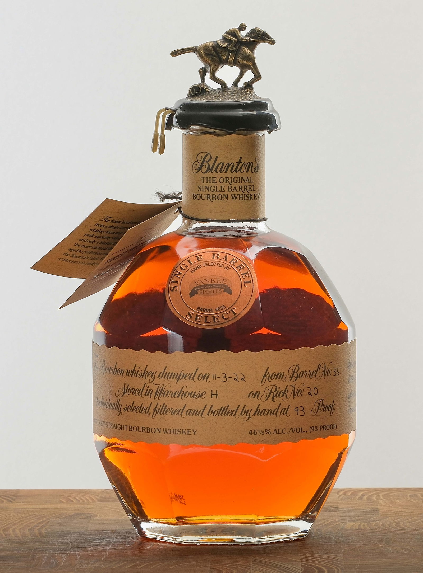 Blanton's Single Barrel Select Bourbon 2022: Hand selected by Yankee Spirits. Barrel #035. Dumped on 11-3-22 from Barrel No. 34. Stored in Warehouse H on Rick No. 20. Registered Bottle No. 47. 93 Proof. 46.5% ALC/VOL (93 Proof). Wax seal intact.