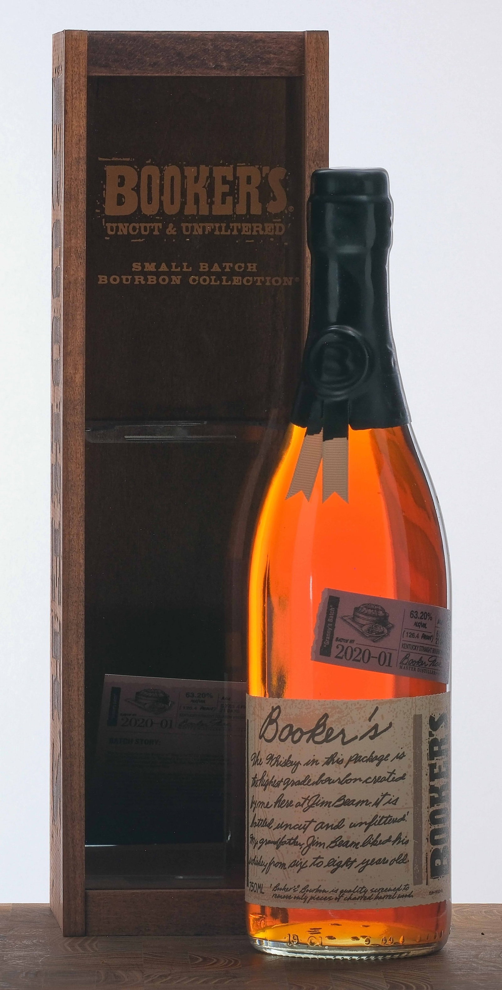 Booker's "Granny's Batch" Small Batch Bourbon 2020: Batch # 2020-01. 63.2% ALC/VOL (126.4 Proof). Aged 6 Years, 4 Months, 21 Days. Wooden box and acrylic window excellent. Includes informational sheet. Wax seal intact. Labels excellent. 750ml. James B.