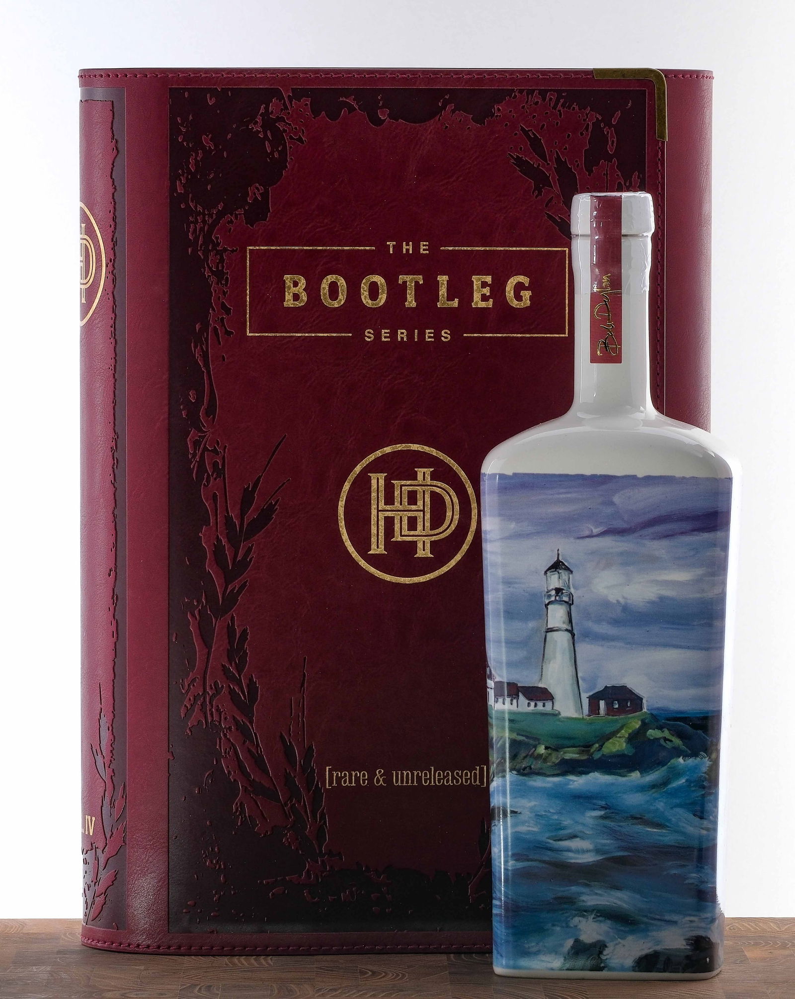 Heaven's Door Bootleg Series Vol. IV 11 Year Wheated Bourbon: Volume Four. "Rare and unreleased." #3,105 of 5,497 bottles produced. Finished in Islay Scotch casks. Handmade ceramic bottle with art by painter/musician Bob Dylan. 55.5% ALC/VOL. Housed within an el