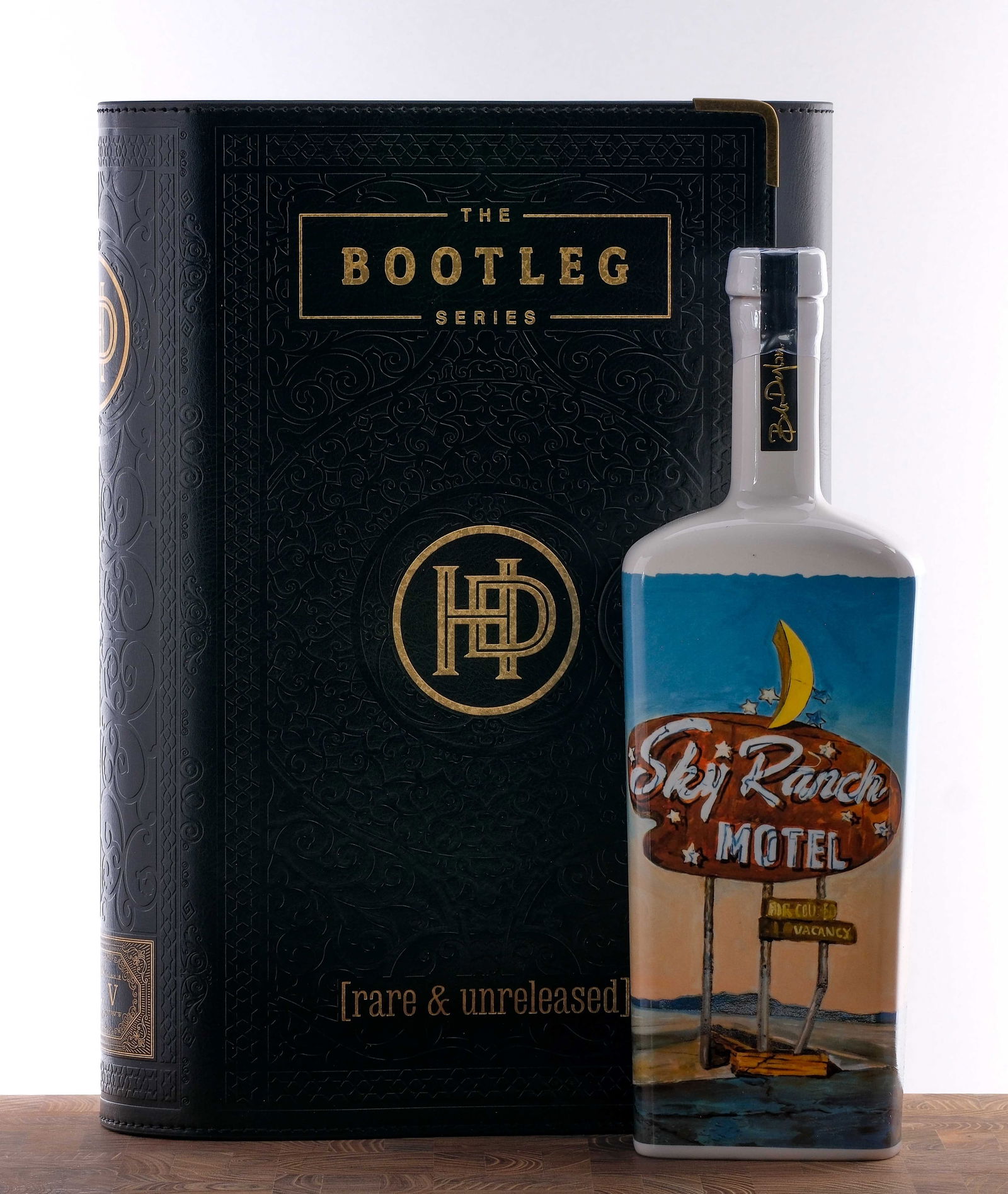 Heaven's Door Bootleg Series Vol. V 18 Year Straight Bourbon: Volume Five. "Rare and unreleased." #3,293 of 10,047 bottles produced. Secondarily finished in Spanish Vermouth casks. Handmade ceramic bottle with art by painter/musician Bob Dylan. 57% ALC/VOL (114