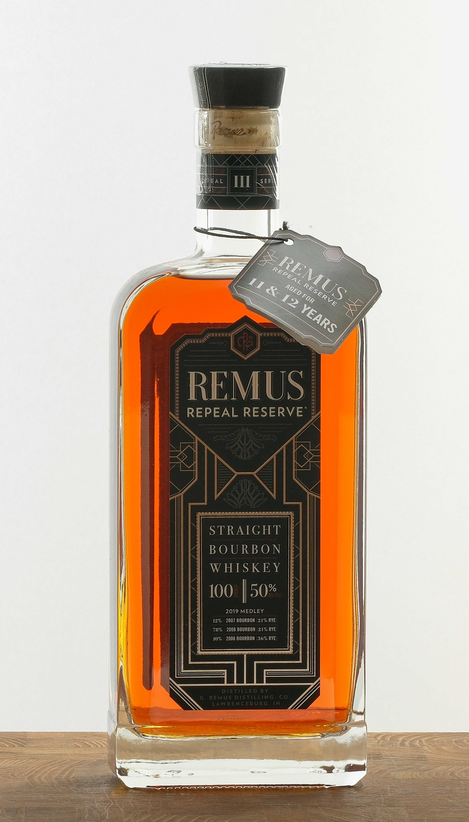 Remus Repeal Reserve 2019 Medley Straight Bourbon: Repeal Series III. Limited Edition. Blend of 12% 2007 Bourbon (21% Rye), 78% 2008 Bourbon (21% Rye) and 10% 2008 Bourbon (36% Rye). 50% ALC/VOL (100 Proof). Plastic seal intact. Hang tag intact. Label