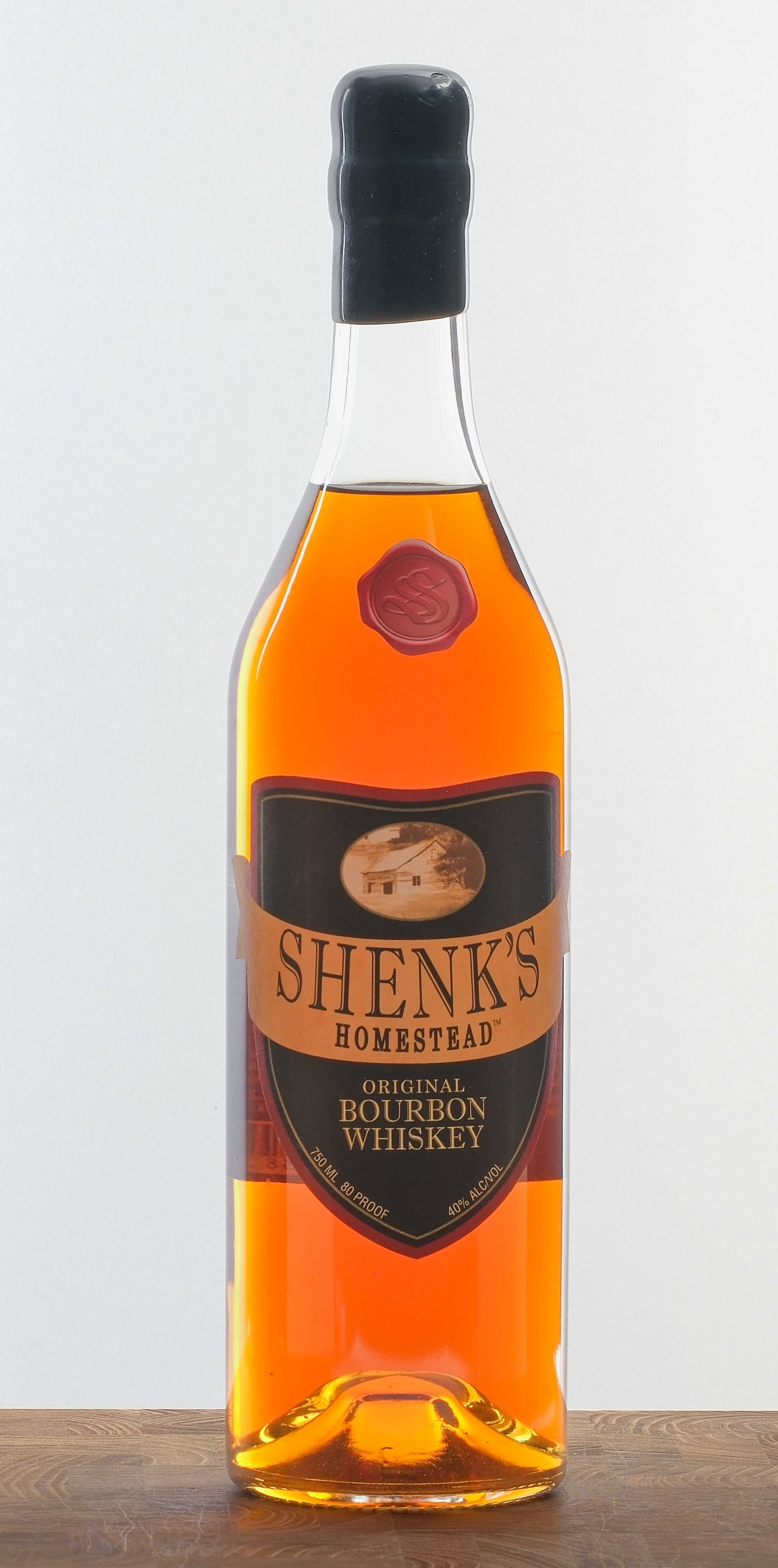 Shenk's Homestead Original Bourbon Whiskey C. 2015: Circa 2015, 40% ALC/VOL (80 Proof). Wax seal intact. Labels excellent. 750ml. Shively Distillery Company. (Michters)