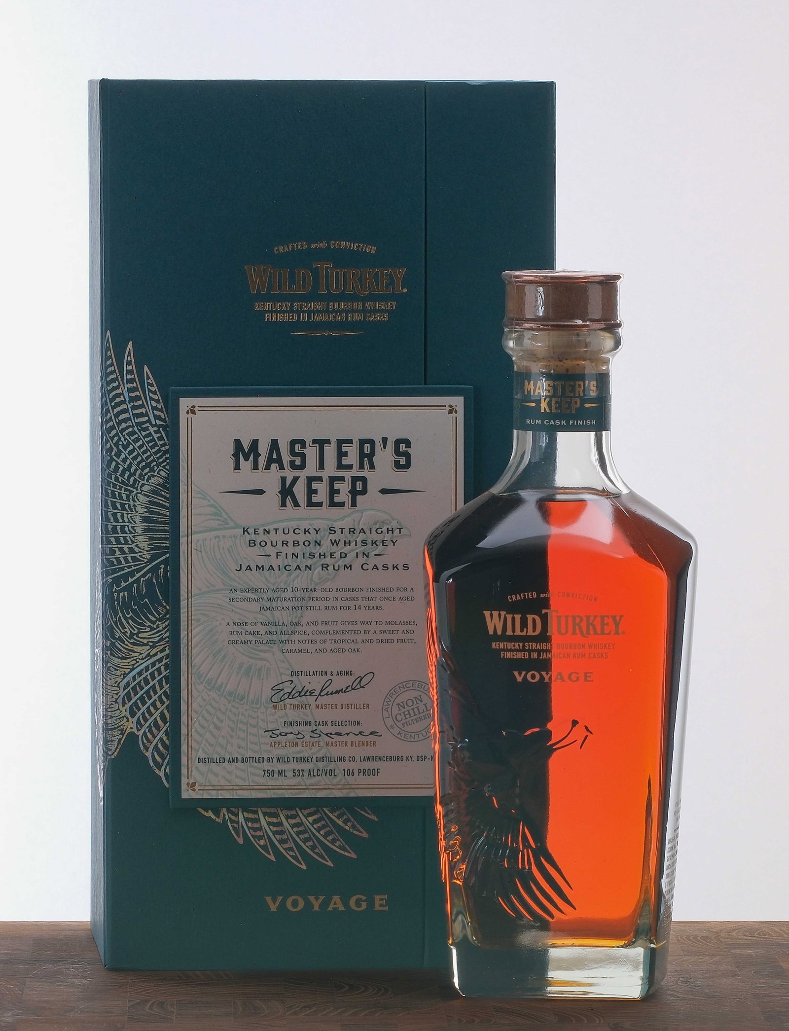 Wild Turkey Master's Keep "Voyage" KY Straight Bourbon: 10-Year-Old Bourbon finished in Jamaican Rum casks. 53% ALC/VOL (106 Proof). Cardboard box excellent (a slight ding at the top of one of the doors is the extent of damage present). Plastic seal on bot