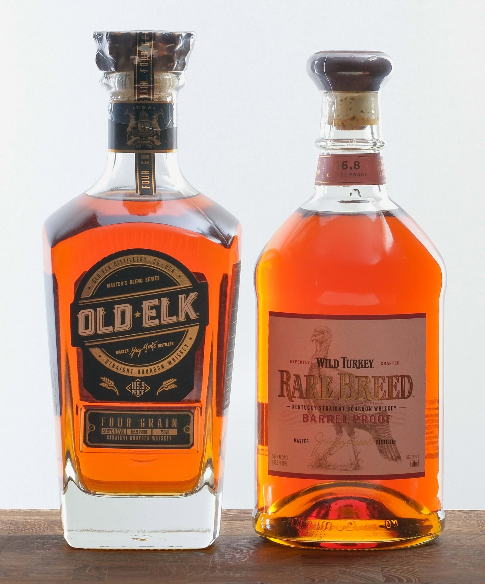 Wild Turkey Rare Breed and Old Elk Four Grain Bourbon Group (2 Bottles): Group of 2 bottles of straight Bourbon Whiskies. 1x bottle of Wild Turkey Rare Breed Barrel Proof Kentucky Straight Bourbon. No. 4 Char. 58.4% ALC/VOL (116.8 Proof). Wild Turkey Distilling Co. 1x bott