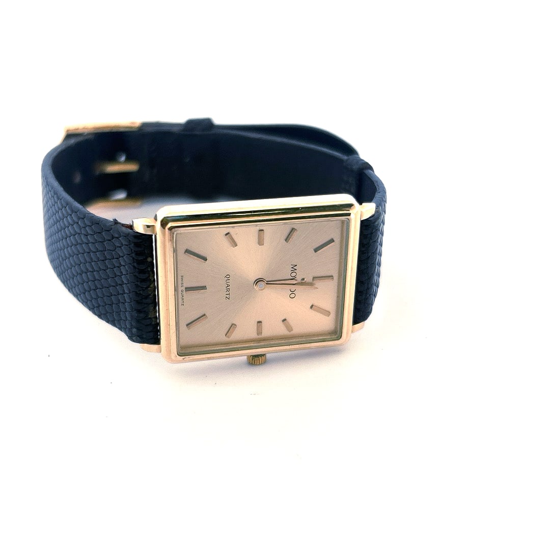 Vintage Movado unisex 14K Gold Wristwatch: Vintage Movado unisex 14K Gold Wristwatch - Serial 7833818/2267 Watch face .75 x 1 inch Leather Watch band 7.5 inches Our Winter Sale takes place ONLINE ONLY, Sunday January 26th 2025 at 11 AM EST. Re