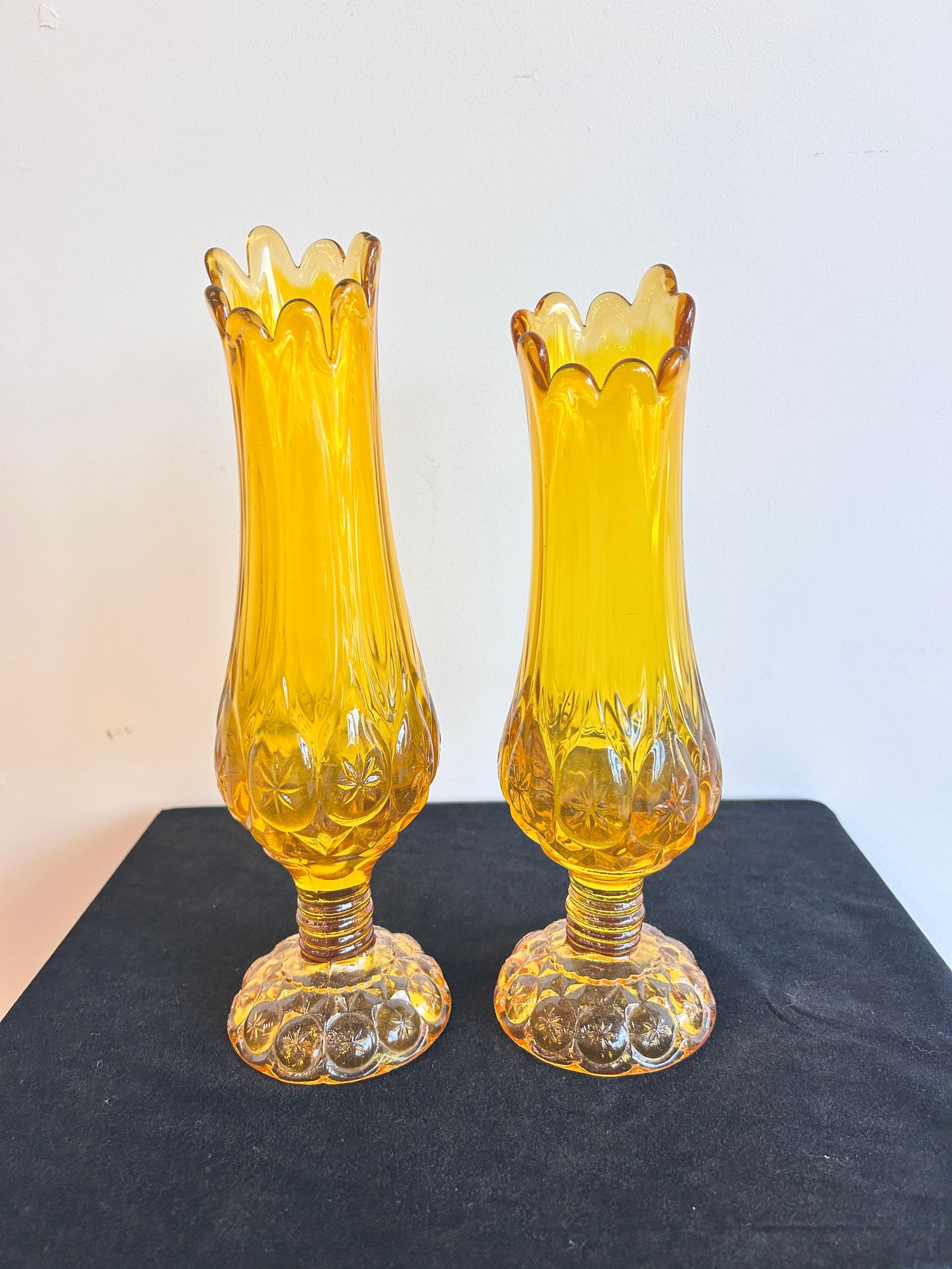MCM Kanawha Amber Swung Glass Vases '66 Moon and Stars Pattern: MCM Kanawha Amber Swung Glass Vases (1966) Kanawha Amber Swung Glass Vases Moon and Stars Pattern 12.5" H Our Winter Sale takes place ONLINE ONLY, Sunday January 26th 2025 at 11 AM EST. Registration