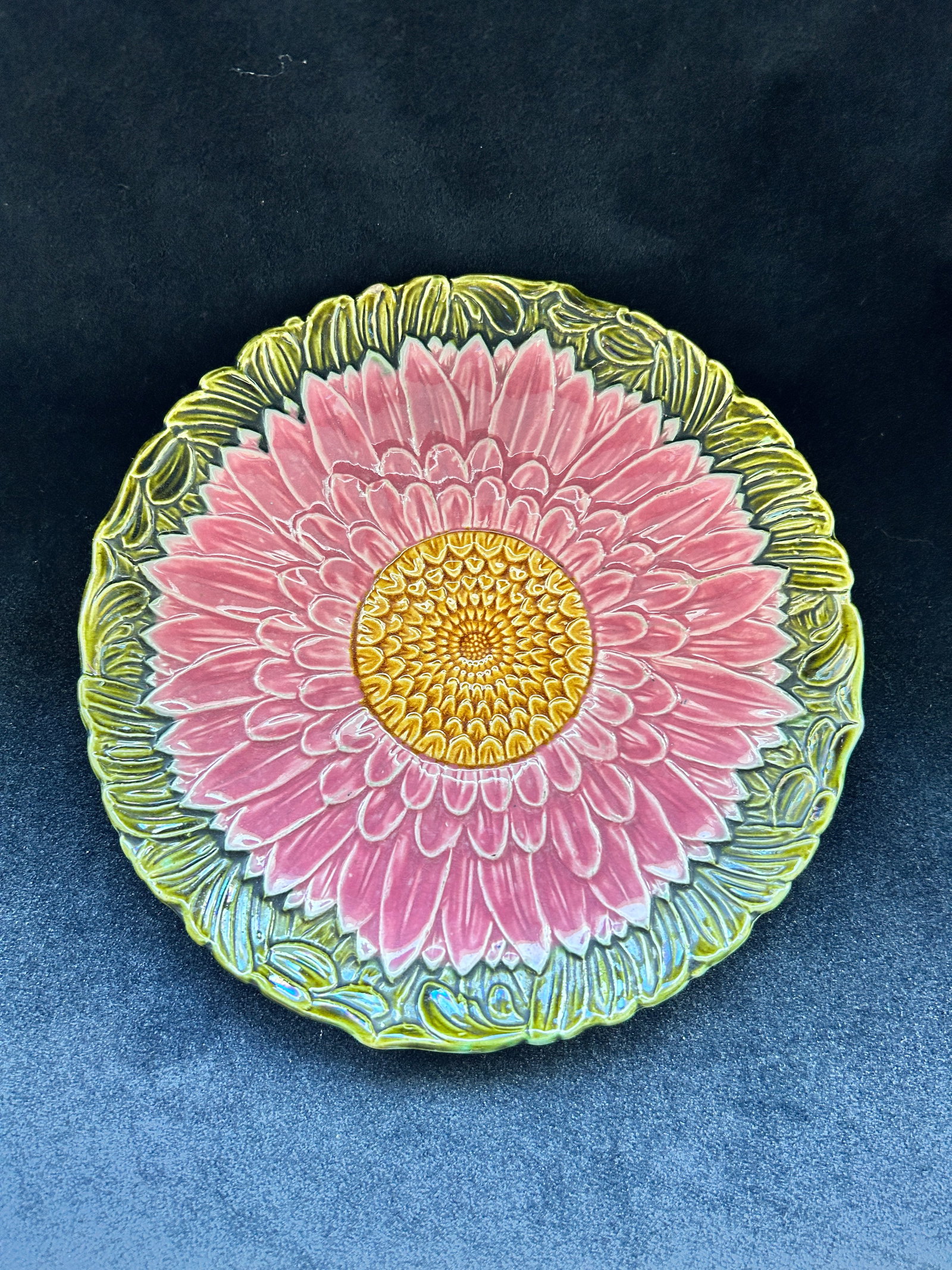 Antique Majolica Plate Chrysanthemum Wardle English: Antique Majolica Plate Chrysanthemum Wardle English 9.25 D inches Our Winter Sale takes place ONLINE ONLY, Sunday January 26th 2025 at 11 AM EST. Registration is open now and during the sa