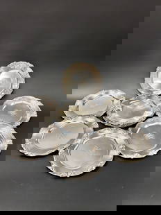 (12) Sterling Bread & Butter Plates Bigelow-Kennard & Co. Art Nouveau: (12) Sterling Bread & Butter Plates Bigelow - Kennard & Co. Art Nouveau Iris pattern and monogrammed American markerd sterling and Bigelow - Kennard & Co Each plate 7 inches D approx. total