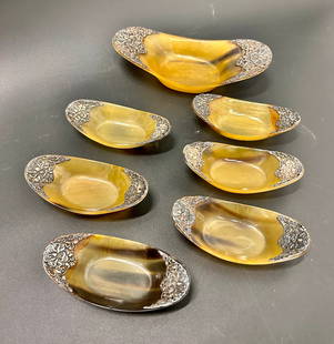 (10) Piece Set Antique Horn and Sterling Dishes: (10) Piece Set Antique Horn and Sterling Dishes One large bowl, 6 small bowls, and 3 spoons large bowl is 8 x 3 d x 2 H inches small 4.75 x 2.25 d x 1.25 h in inches 