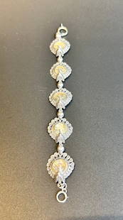 Vintage Sterling Abalone Peacock Bracelet: Vintage Sterling Abalone Peacock Bracelet marked sterling 7.5 inches long CONDITION: Good Join us online for Long Lake Art and Antique's Spring Sale, June 1st, 2025, 11 AM