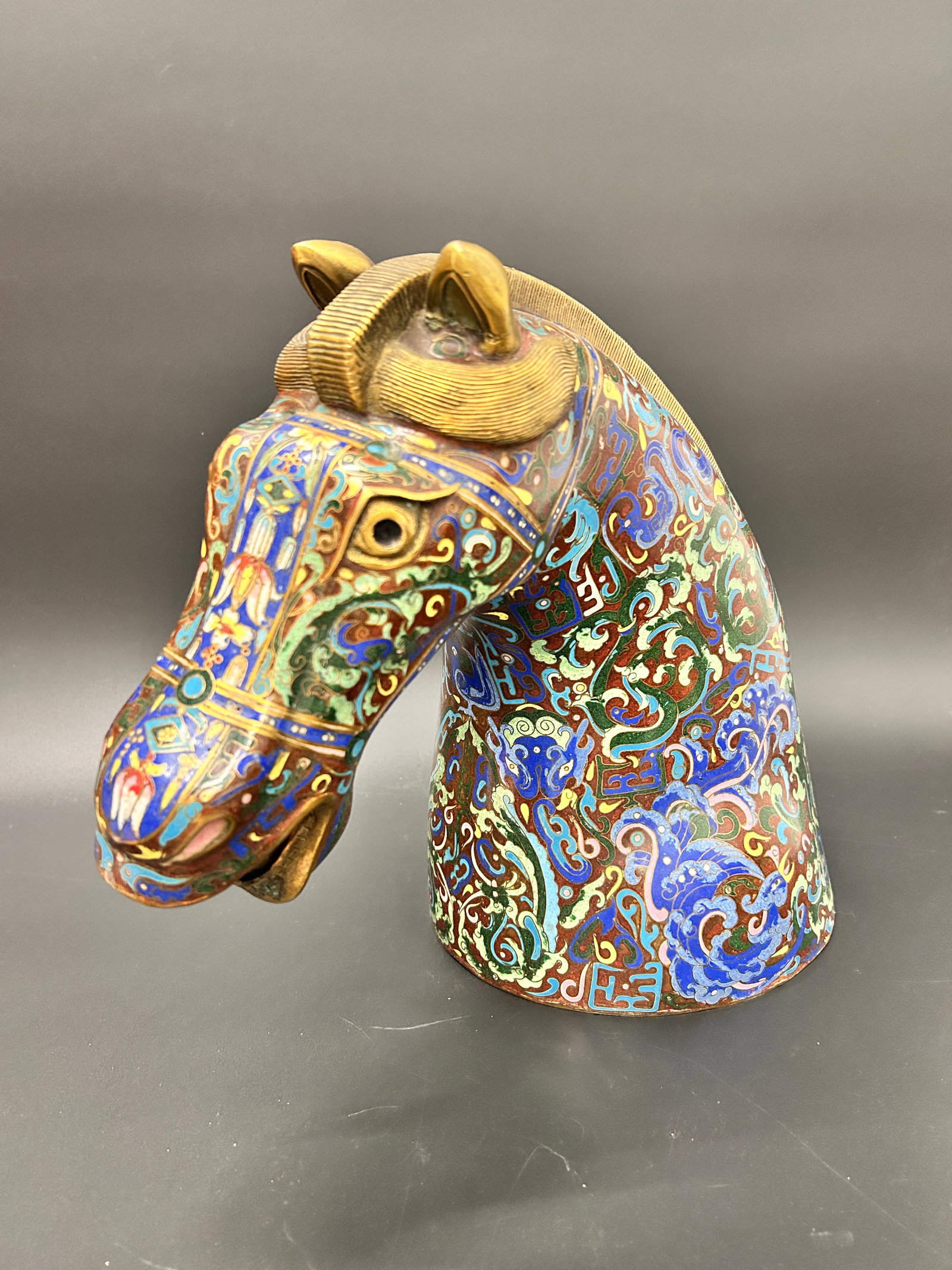 Large Chinese cloisonne Horse head: Chinese cloisonne Horse head measures: 17 w x14 high x 9 d in inches Condition: good Join us online for Long Lake Art and Antiques Spring Sale, June 1st 11 AM EST. Preview Saturday