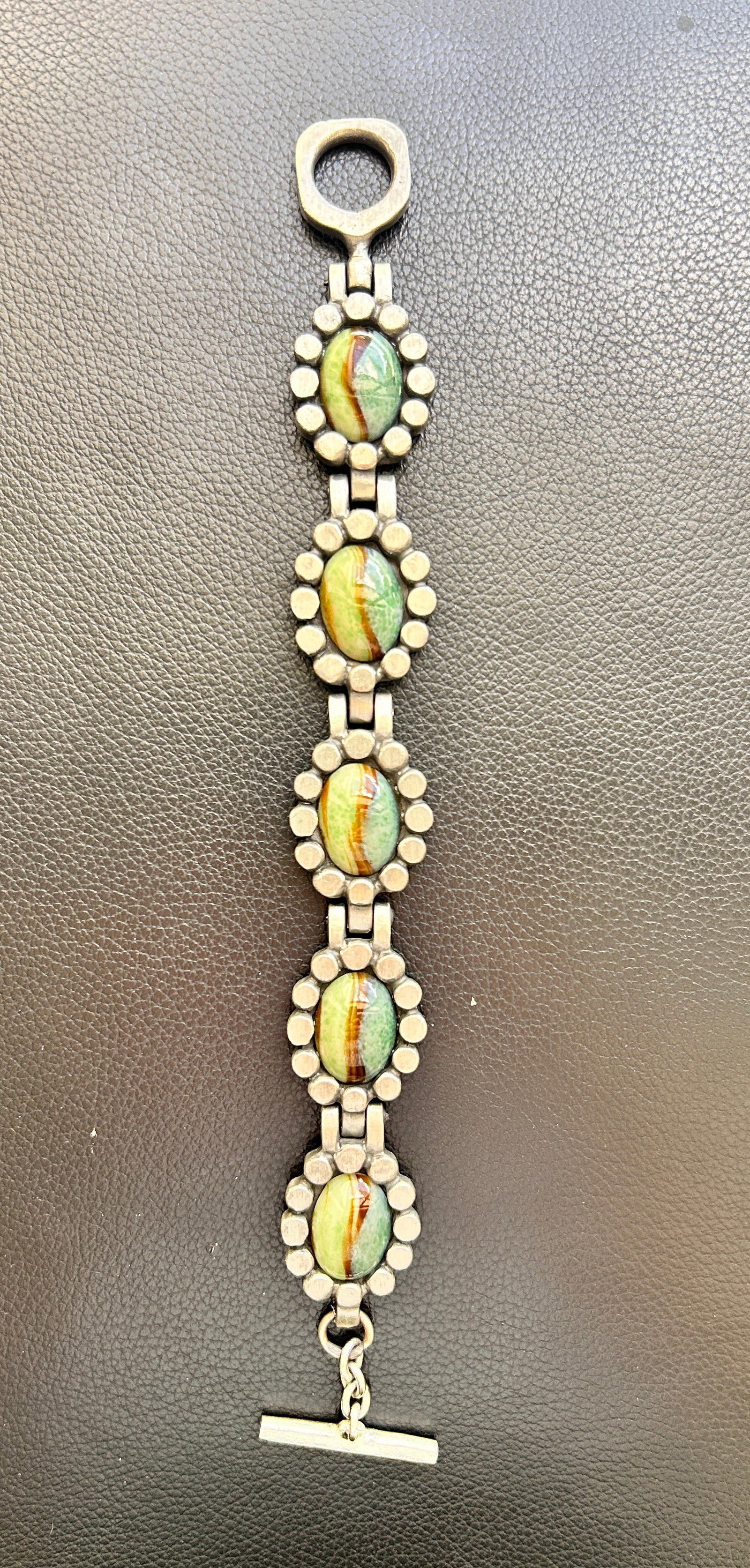 Bent Larsen Bracelet Denmark Pewter 1960's marked/signed: DESCRIPTION: Bent Larsen Bracelet Denmark Pewter 1960's marked/signed MEASUREMENTS IN INCHES ARE DISPLAYED IN THE PHOTOS CONDITION: GOOD JOIN US ONLINE FOR THE LONG LAKE