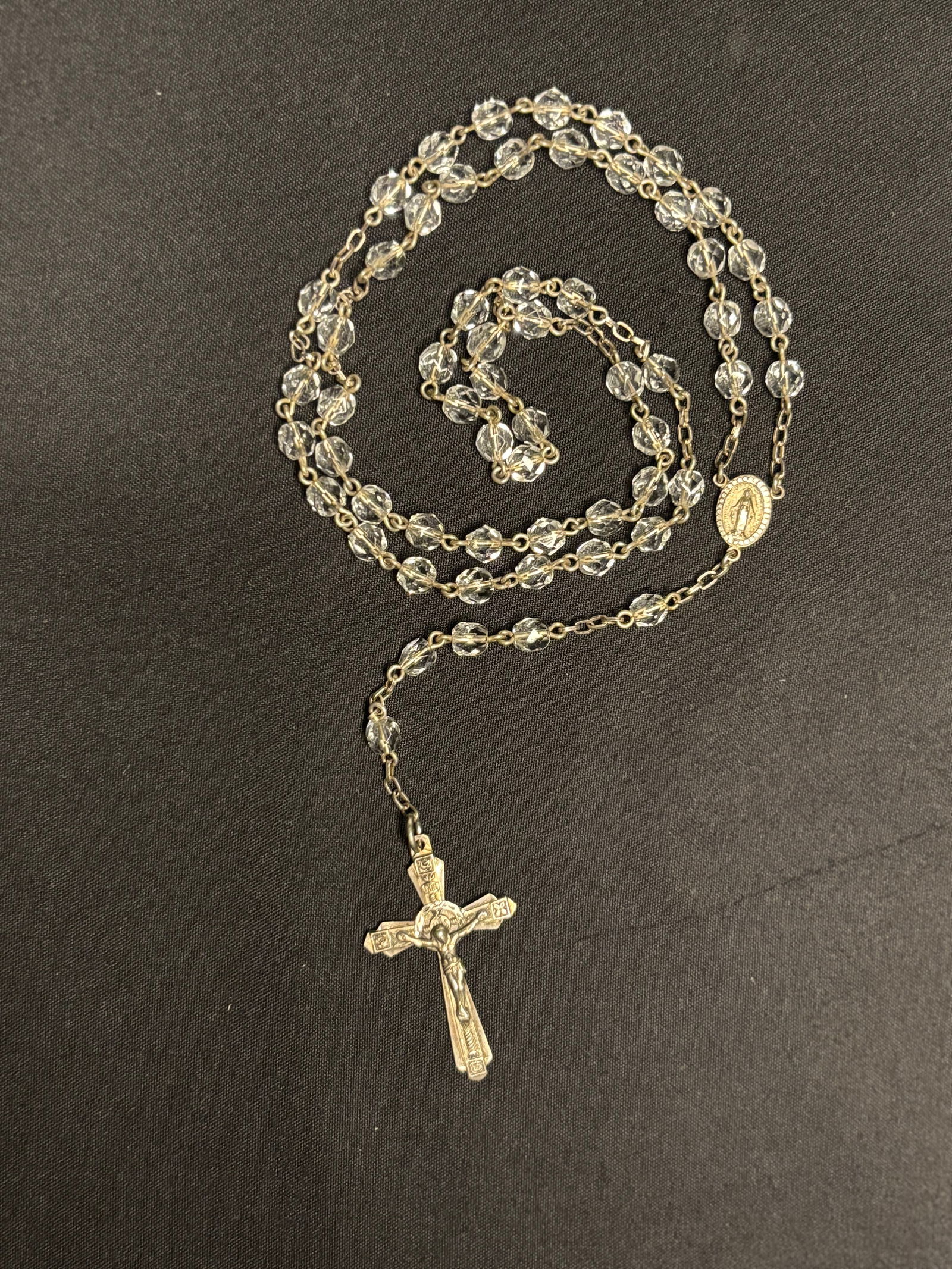 Vintage .925 Sterling Pieces: 9 Crosses, Medals , 1 Rosary: DESCRIPTION: Vintage .925 Sterling Pieces: 9 Crosses + Religious Medals and 1 Rosary - Crystal with Sterling Cross (App. 27g) MEASUREMENTS IN INCHES ARE DISPLAYED IN THE PHOTOS 