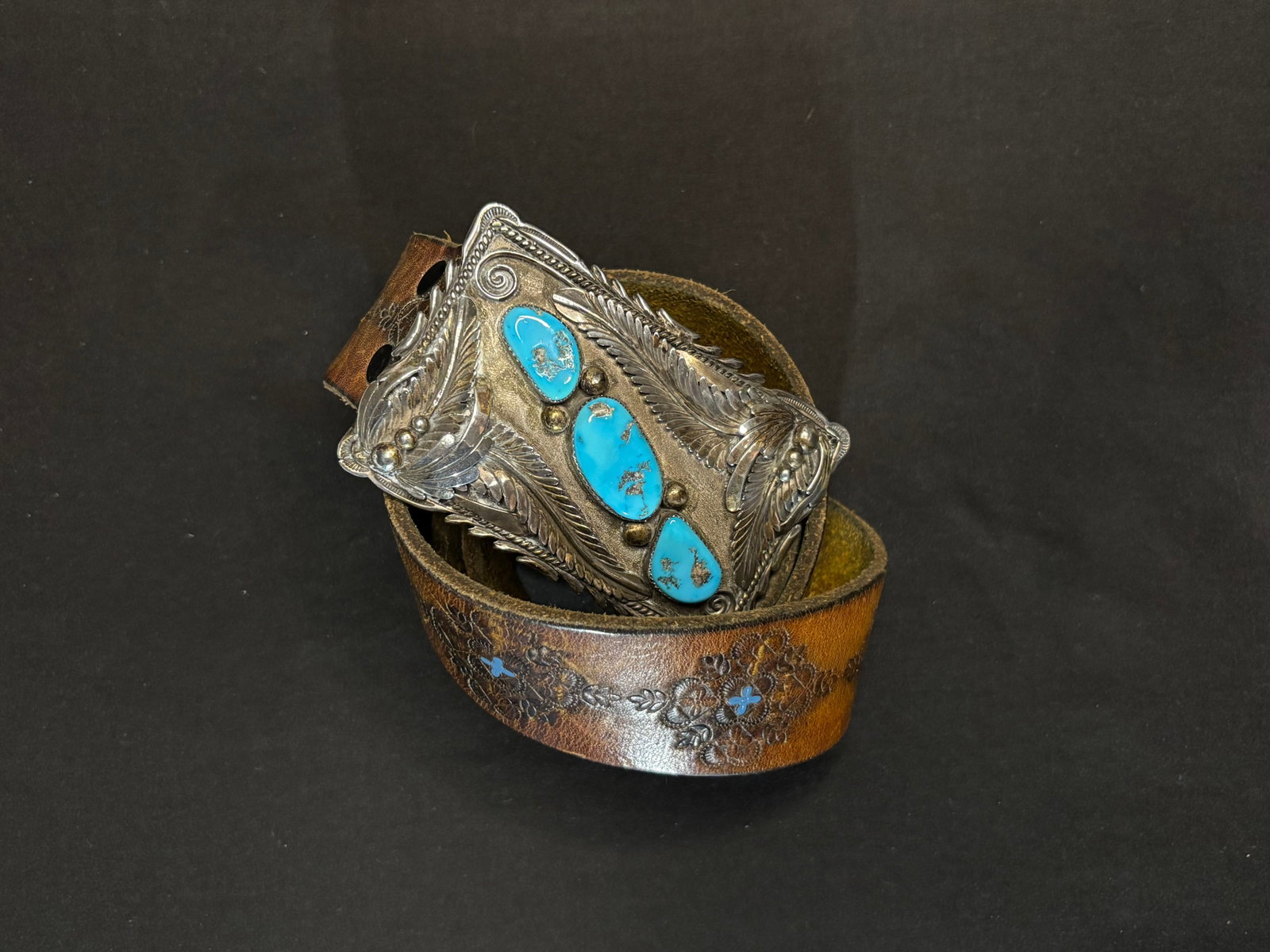 Vintage Navajo Belt Buckle + Leather Belt, Silver + Turquoise: DESCRIPTION: Vintage Navajo Belt Buckle + Leather Belt After Justin Morris, Silver + Turquoise MEASUREMENTS IN INCHES ARE DISPLAYED IN THE PHOTOS CONDITION: GOOD <