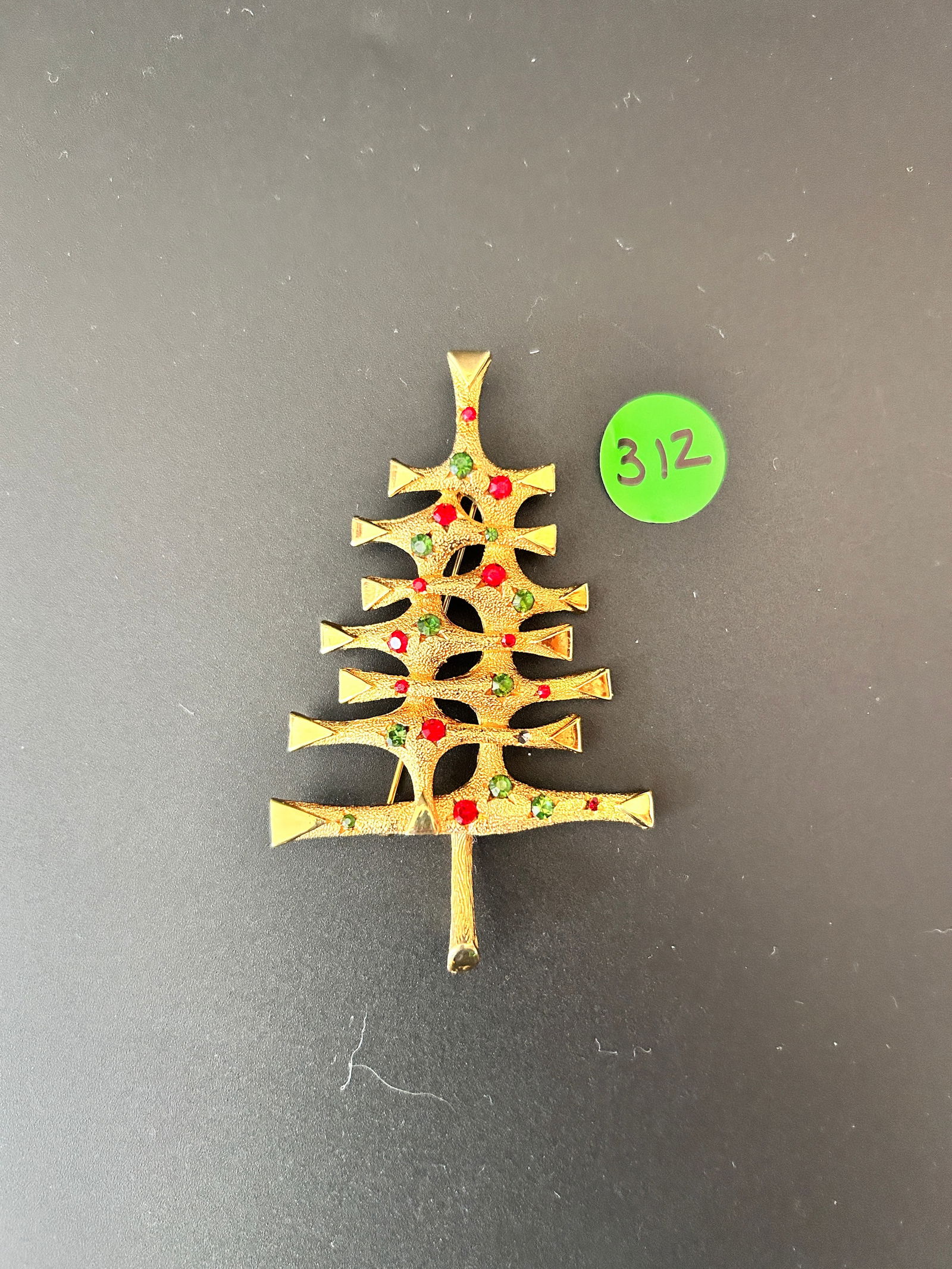 Christmas Tree Brooch MYLU large MCM: DESCRIPTION: Christmas Tree Brooch MYLU large MCM MEASUREMENTS IN INCHES ARE DISPLAYED IN THE PHOTOS CONDITION: GOOD JOIN US ONLINE FOR THE LONG LAKE A