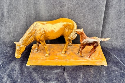 Bronze statue of mare and colt