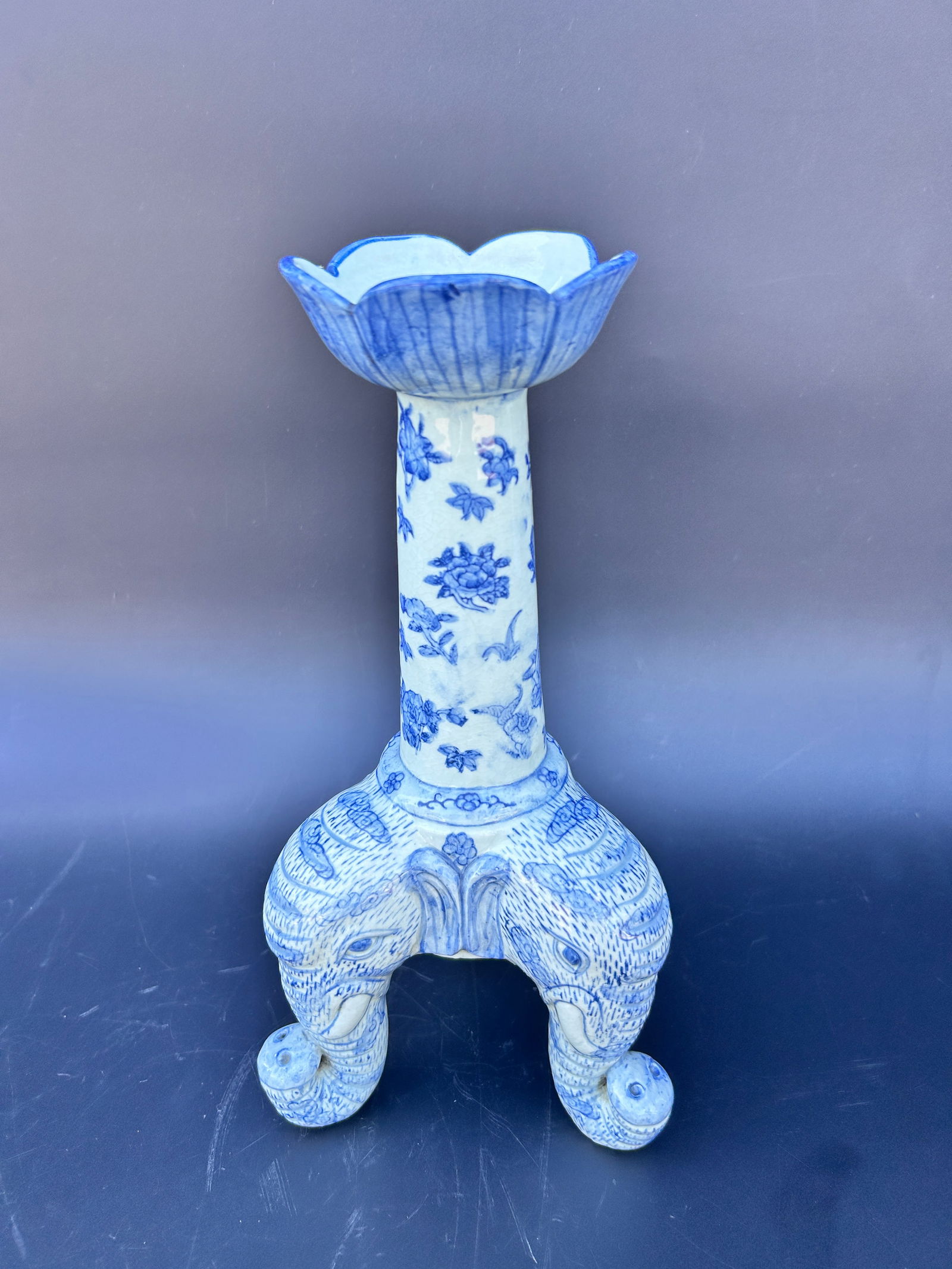 Chinese porcelain candlestick with elephants on base (1 of 1)