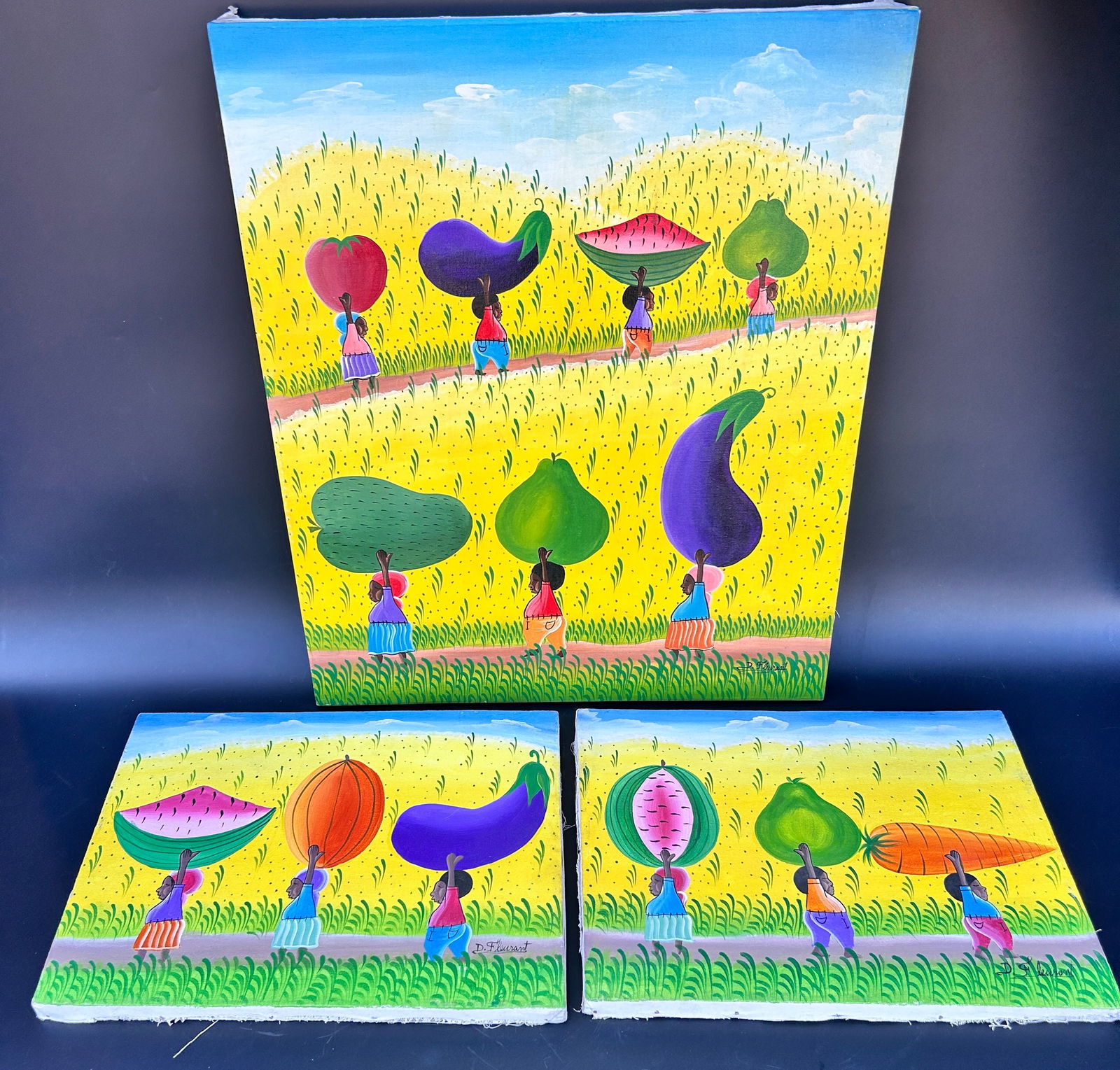 (3) Haitian Paintings signed D. Fleurant:  Three (3) Haitian Paintings signed D. Fleurant measures: People carrying giant fruit 