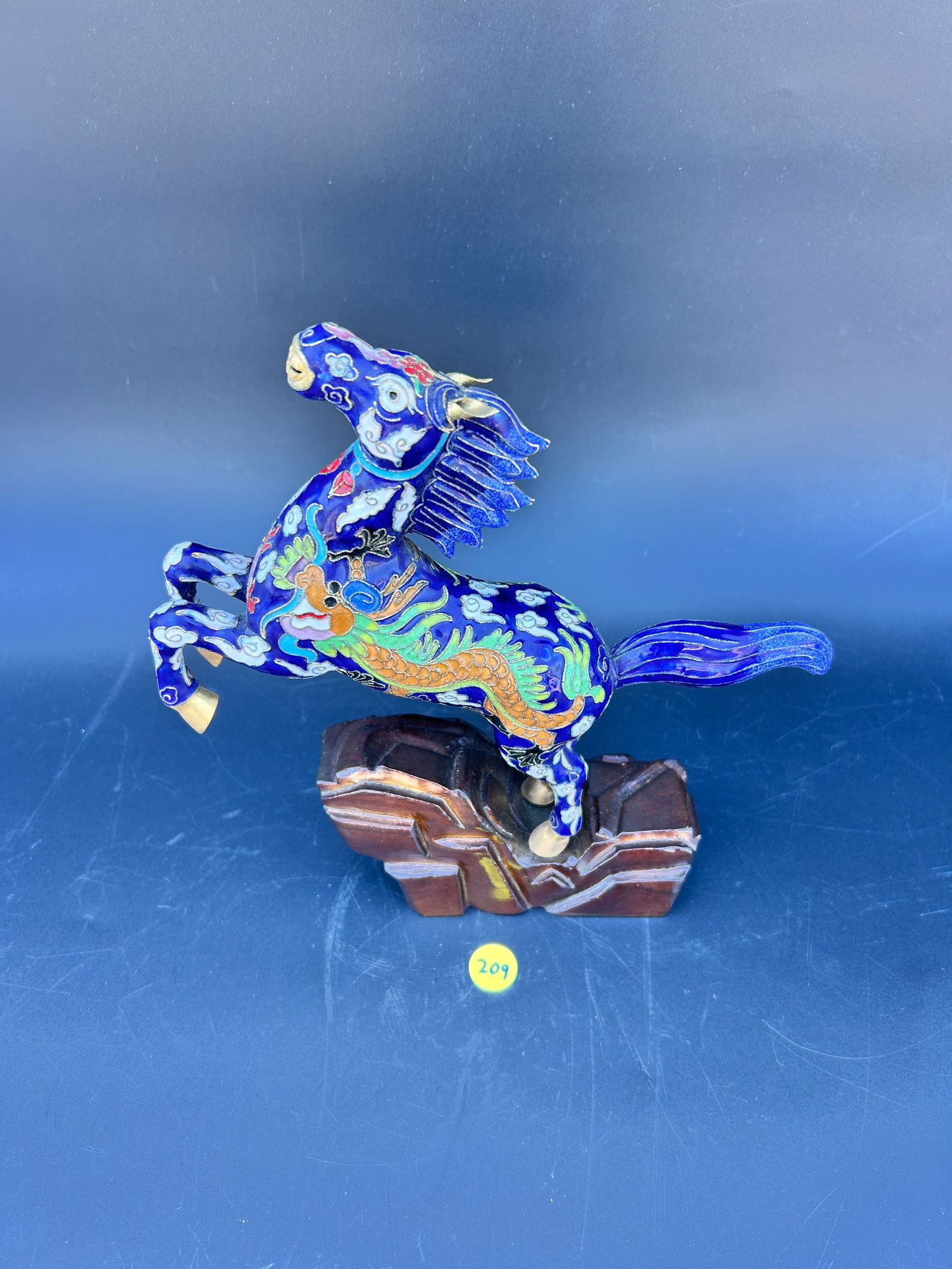 Modern Cloisonne Horse with dragon motif, on base:  Modern Cloisonne Horse with dragon motif, on base measures: 9.5W x 10H condition: good IN-HOUSE SHIPPING AVAILABLE