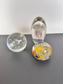 (3) glass paperweights jellyfish, flowers, bubbles