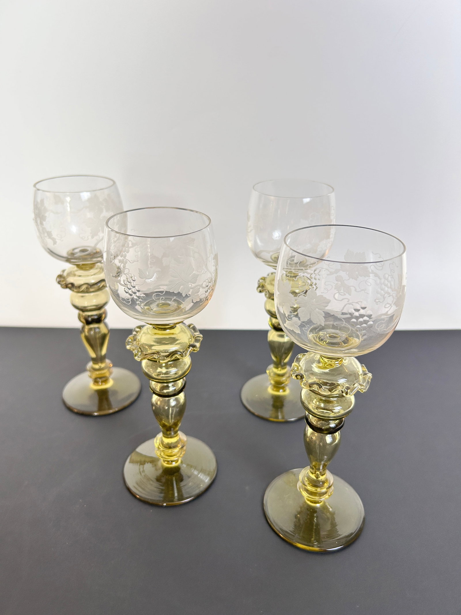 Roemer wine glasses 4 amber stems: Roemer wine glasses 4 Dimensions in inches: 8 H Condition: good IN-HOUSE SHIPPING AVAILABLE PLEASE EMAIL: longlakeart@gmail.com for more info. PREVIEW OPPORTUNITIES: Virtual Previews: Available via Fa