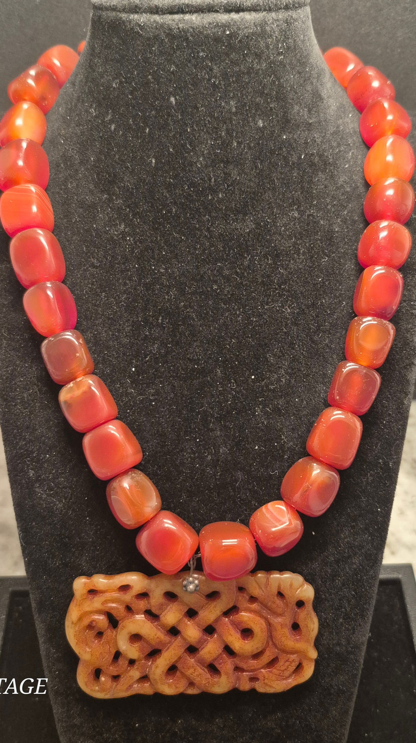1960's Carnelian Beads Necklace w/ carved Knot pendant Brown Jade.: 1960's Genuine Carnelian Beads Necklace w/carved Knot pendant of Brown Jade. 177g.In-house domestic shipping is available, email for more information. All items ship from Sarasota, FL. Pick up must be