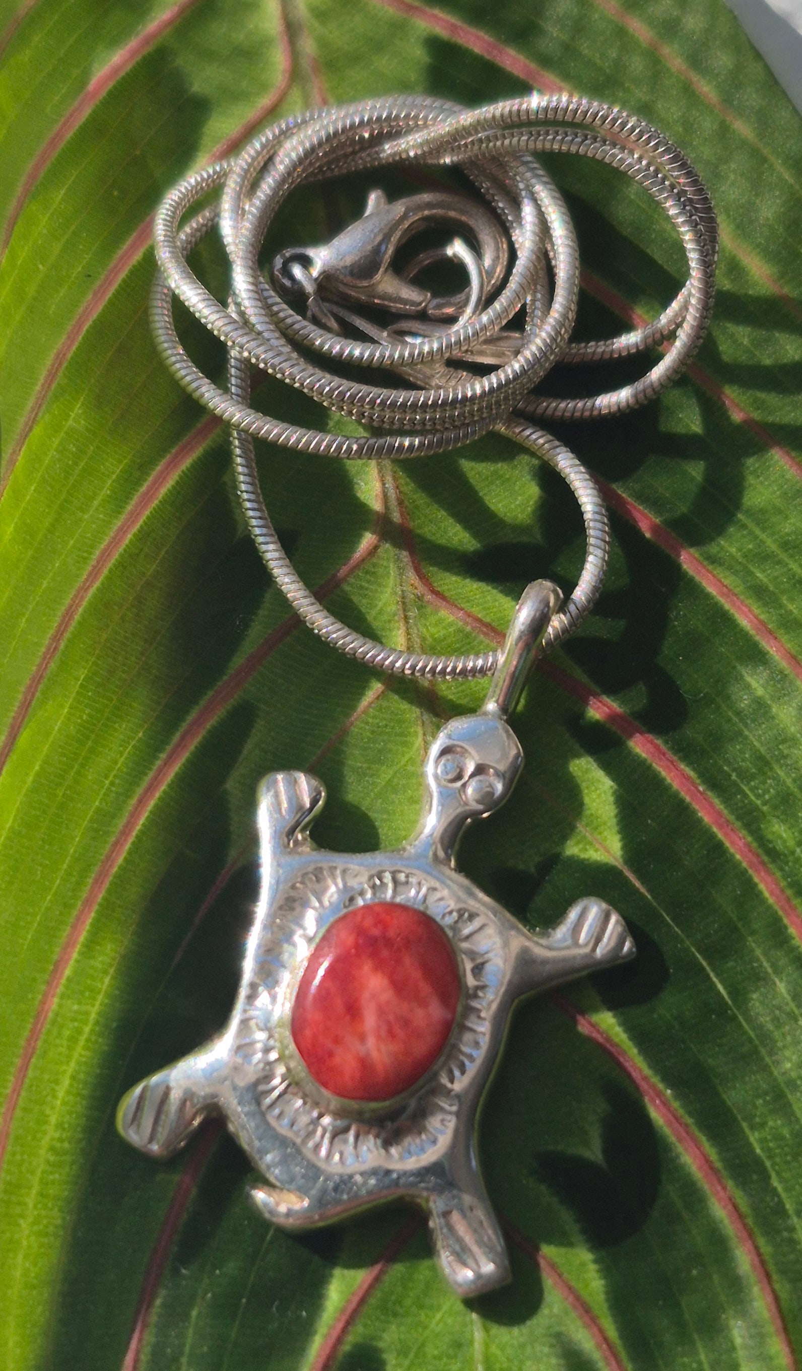Joseph Martinez Navajo Sterling Coral Turtle Pendant: Joseph Martinez Navajo sterling Coral turtle Pendant 5.53 grams Includes round snake chain w/ lobster clasp. In-house domestic shipping is available, email for more information. All items ship