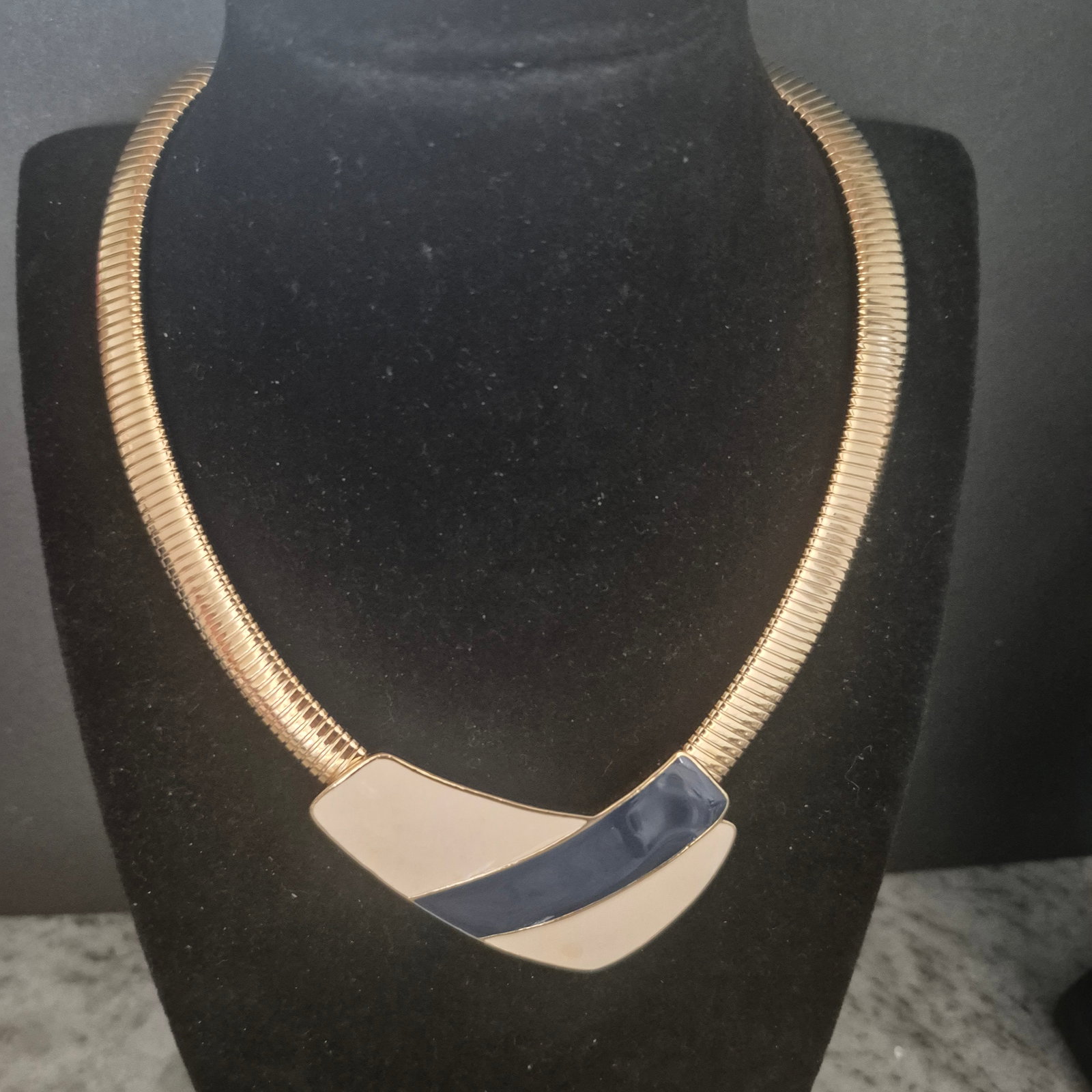 TRIFARI goldtone Necklace w/ Navy and Cream Enameled choker: TRIFARI goldtone Necklace w/ Navy and Cream Enameled choker Necklace is .25" d , enameled is 3.25" / 2"h, in excellent condition, no scratches or issues. - In-house domestic shipping is available, ema