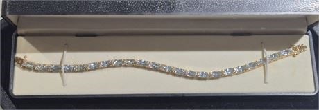14K Gold Plated TENNIS BRACELET w/ Azure CZ stones: 14K Gold Plated TENNIS BRACELET w/ Azure CZ stonesNEW in presentation box....never wornmade in Thailand=====================================================
