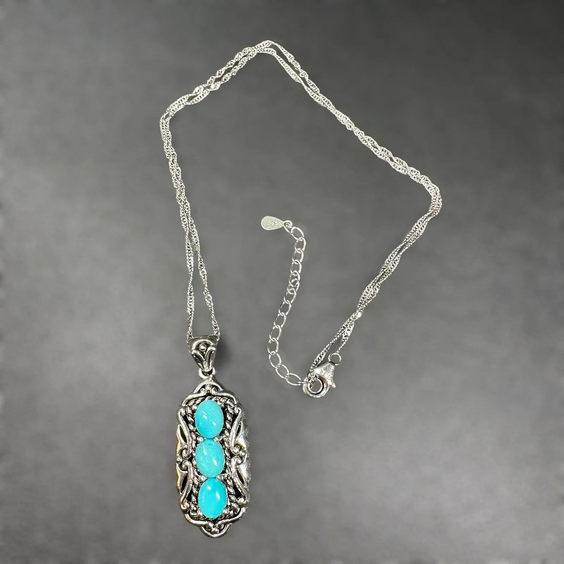 BBJ 925 Sterling Silver Turquoise Pendant Necklace ~ 18" [9g]: 18"/9g BBJ 925 Sterling Silver Turquoise Pendant Necklace:Brand/Model: Unidentified artisan. Hallmark "BBJ."Manufacturer Location: Bangkok Ratnaraj Jewelers in Thailand.Year Produced: Unknown.Conditio