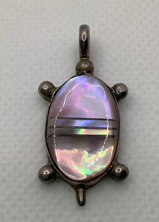 Latone And Bradley Sterling Silver And Mother Of Pearl Turtle Pendant [9.6g]: Latone And Bradley Sterling Silver And Mother Of Pearl Turtle Pendant [9.6g]Mother of pearl turtles shells set in 925 sterling silver jewelry1 3/8” x 5/8” pendantno loss of MOP