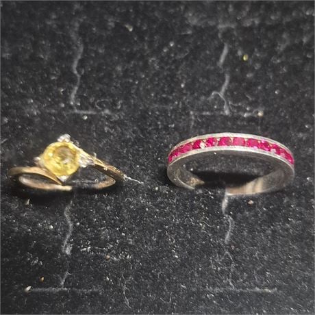 14k Gold HGE Ring & Sterling Ring w/ red rhinestones set [3g]: 14k Gold HGE Ring & Sterling Ring w/ red rhinestones set > 14k gold ring with yellow stone and CZ chips flanking> Red rhinestone is 925 marked> sizes 4 & 6