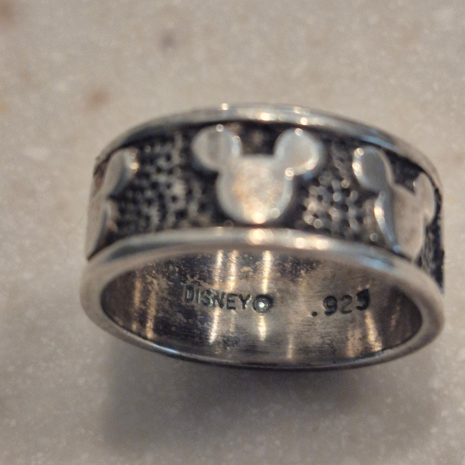 Sterling 925 MICKEY MOUSE profile Disney Icon Ring Band [2g]: Sterling 925 MICKEY MOUSE profile Disney Icon Ring Band [2g]> scuffs commensurate with age and vintage. Toned and returned to luster> no damage, out of round or nicks.> size: 4.5excellent condition