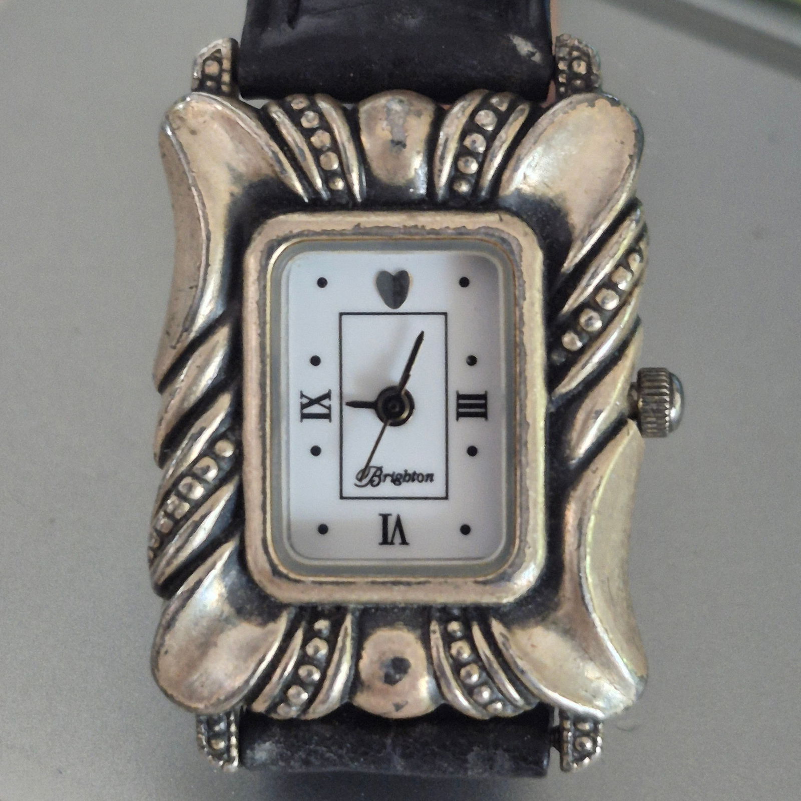 Brighton DAYTONA Silver Rectangle face w/black leather watchband: This Model Watch was made with the Number "6" upside down.That is the way it was designed. Actual pixs.> black leather band in good condition no splits or breaks new b