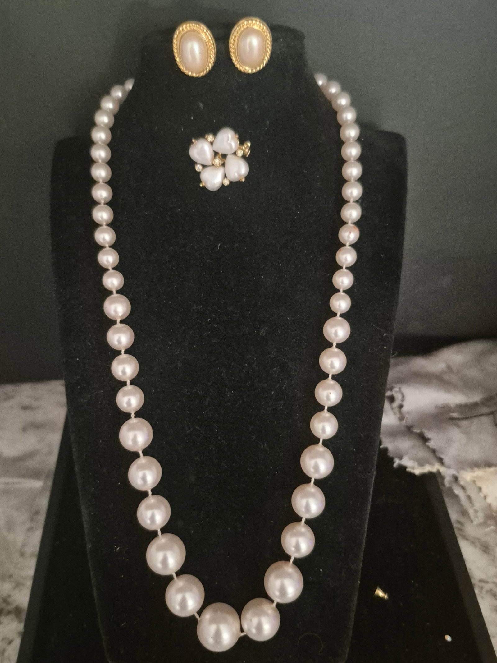 Pearl Set for Couture Nite ~ Necklace/ Brooch / Earrings: Necklace is graduated faux heavy pearls with "c"closureBrooch is a cluster of 4 hearts, daintyEarrings complete the ensambleall in great condition.....to behold