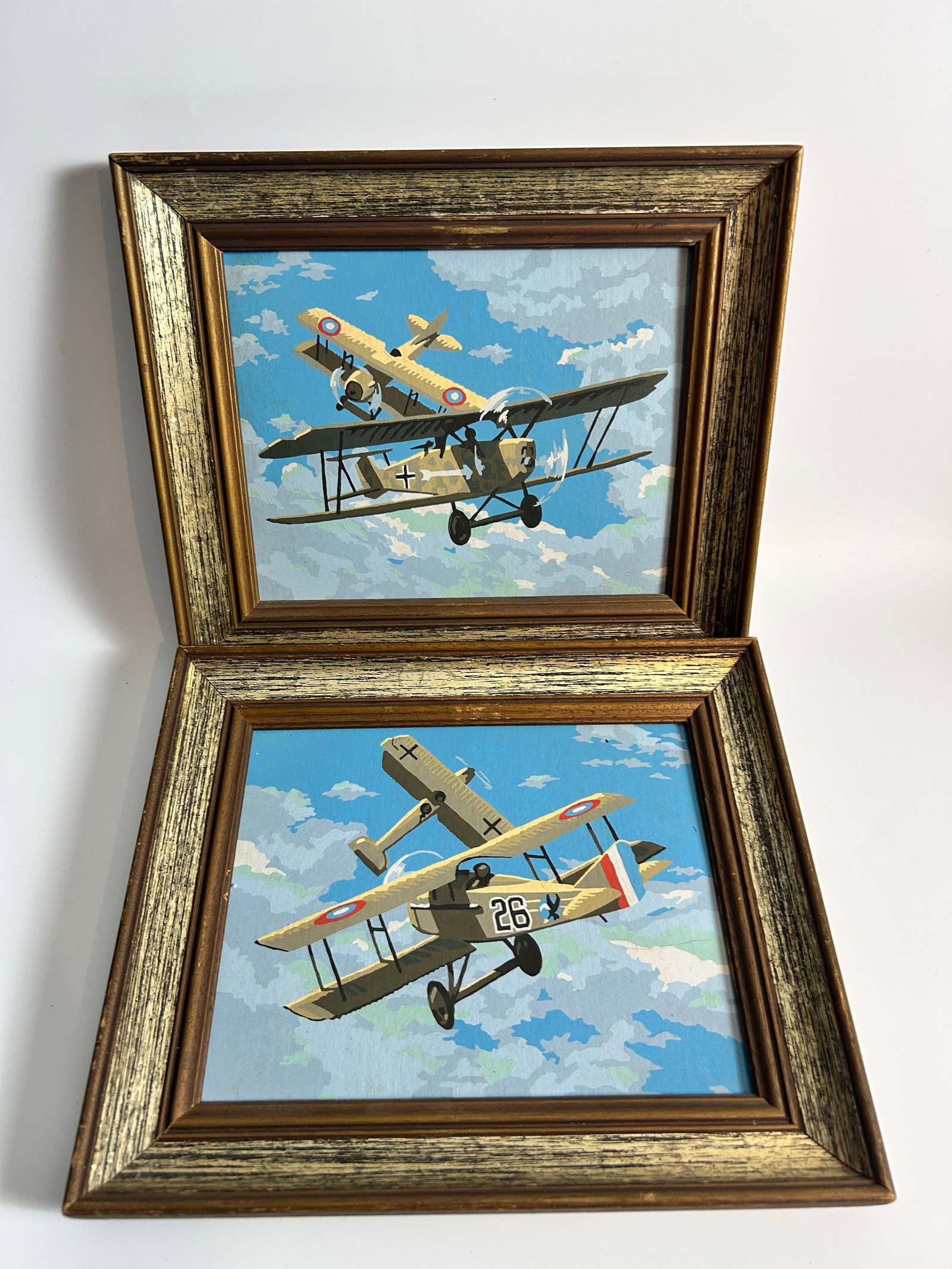 1950's Pair paint by number Biplanes: 1950's Pair paint by number Biplanes, each measure 13.25 x 11.25 in inches