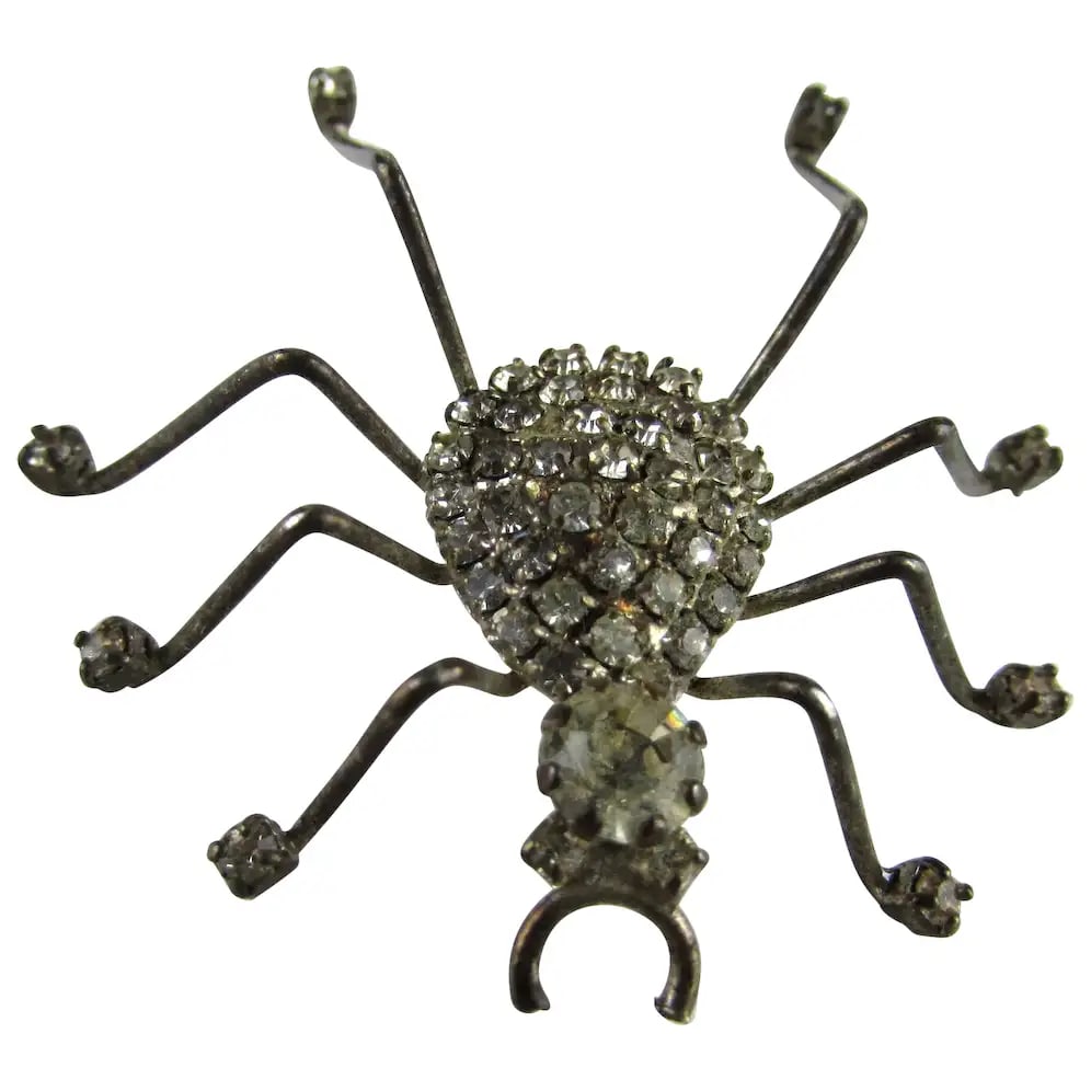 Vintage silver tone Spider Pin w/ clear crystal accents: Vintage silver tone Spider Pin w/ clear crystal accents size: 2"w / 2.25"long good condition, pin works well