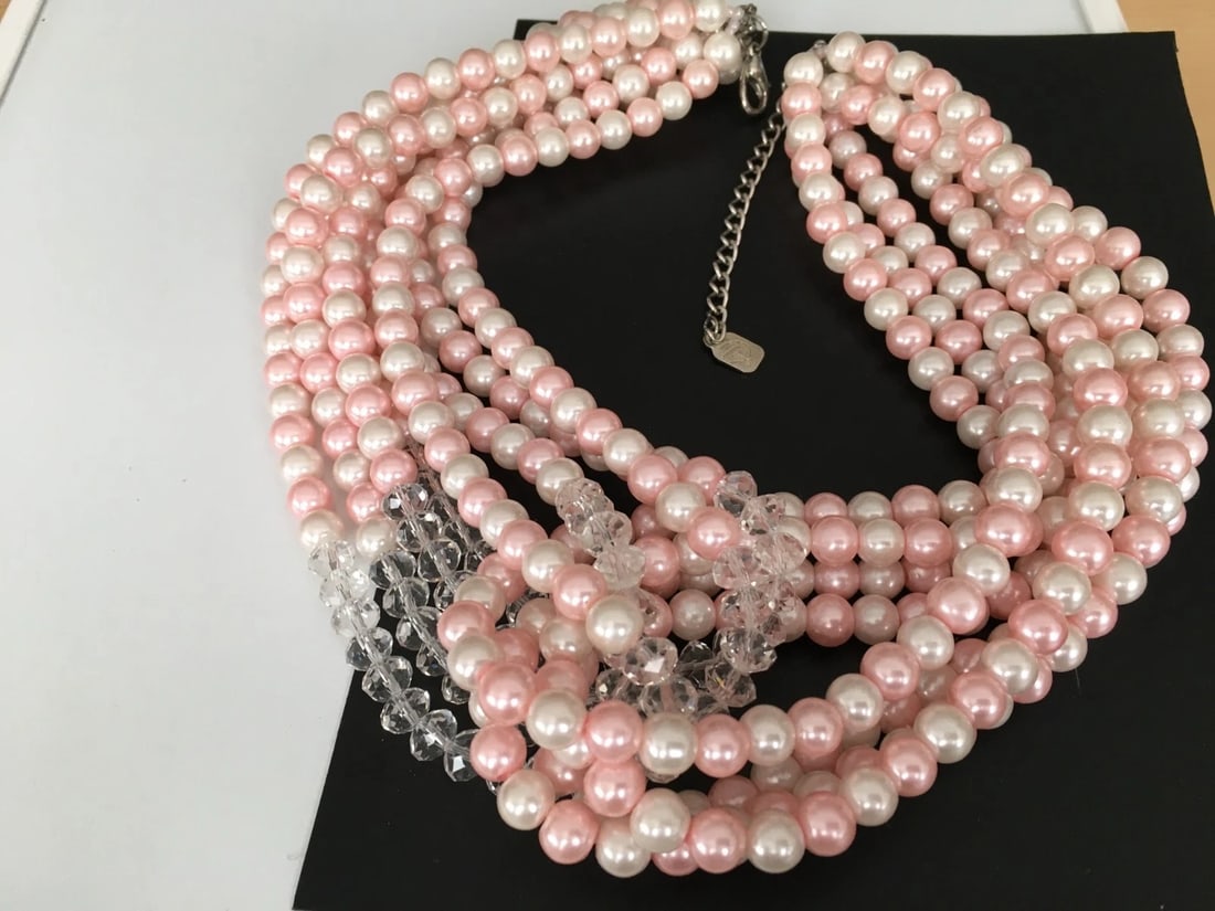 BIG CHUNKY Necklace SIGNED "You & I" ~ Pink Faux Pearl Glass Crystal Bead Multi Strand: BIG CHUNKY Necklace SIGNED "You & I" ~ Pink Faux Pearl Glass Crystal Bead Multi Strand> 8 strands of faux pearls.> closure is lobster claw> signature tag is from "YOU & I"All stones in place, no damag