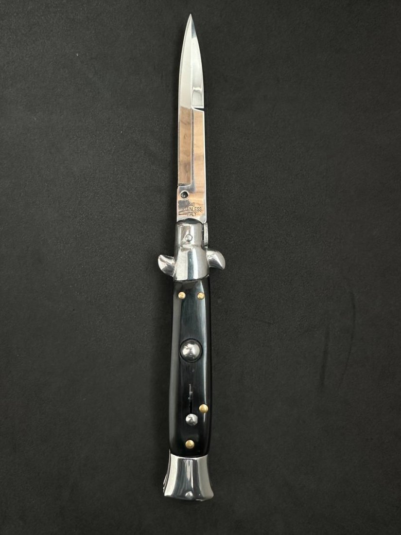 Italian Stiletto Switchblade Knife 8.7 Inches: Italian Stiletto Switchblade Knife 8.7 Inches. The blade of the knife bears the mark 440 Stainless Italy. The knife is in excellent technical condition