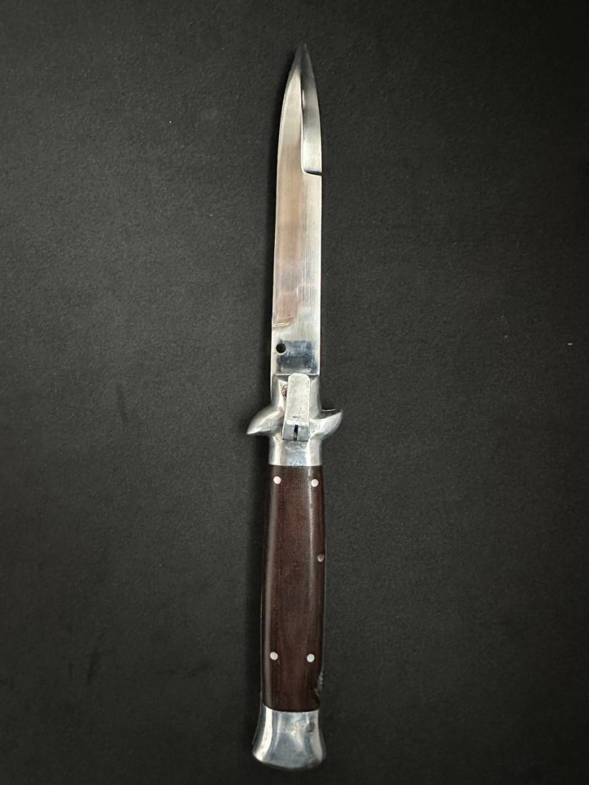 Switchblade knife Handmade Prison Art "Loverlock" USSR 8.66 inches: Switchblade knife Handmade Prison Art "Loverlock" USSR 8.66 inches. The knuckles are made of brown carbolite, the handle is made of aluminum. Stainless steel blade.