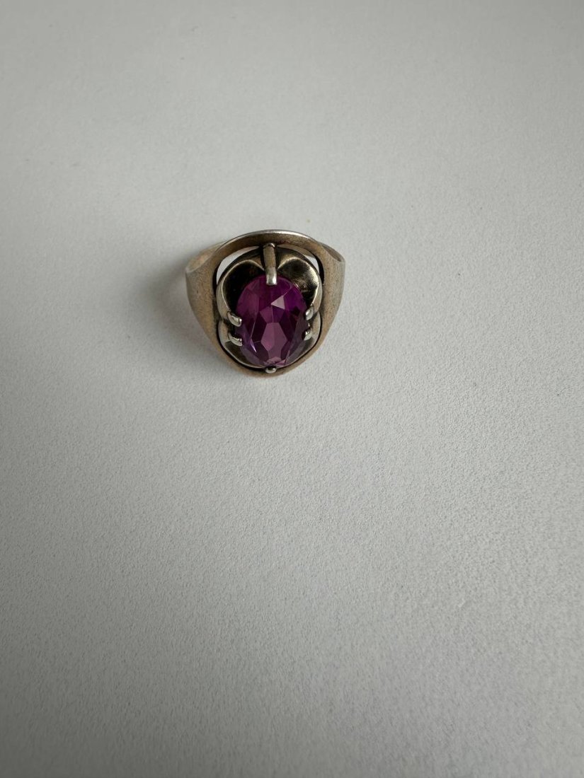 Silver Ring with Gilding with an artificial Ruby of the USSR: Vintage ring made of sterling silver 875 with gold plating. The ring was made at the Kharkov Jewelry Factory in the 70s'. Stone in the form of an oval ruby artificially introduced in the USSR. Ring si
