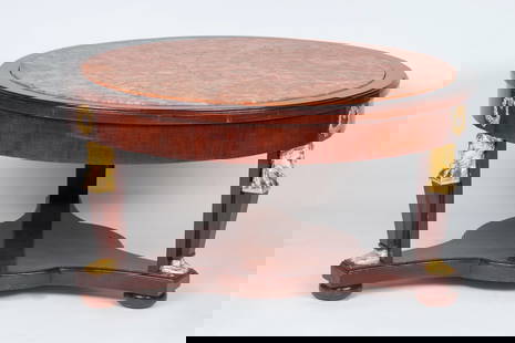 Empire Round Table, 19th-20th century: A round table with a stone tabletop, 19th-20th century, Empire. Wood (mahogany veneer, carving, gesso, gilt) and stone (red granite). Height 47 cm (18 1/2 inches), diameter of tabletop 90 cm (35