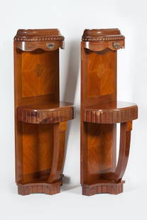 A Pair of Bedside Tables, Modern, 20th century: Lot of two bedside tables, Modern, early 20th century.Wood, different varieties. Each decorated with bronze applique. Electrified. Dimensions 125 x 30 x 45 cm (49 1/4 x 11 3/4 x 17 3/4 inches).