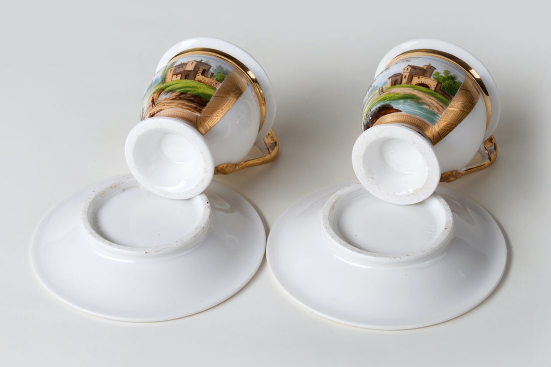 A Pair of Cups with Saucers, Polychrome Painting. A Pair of Cups with Saucers, Polychrome Painting.