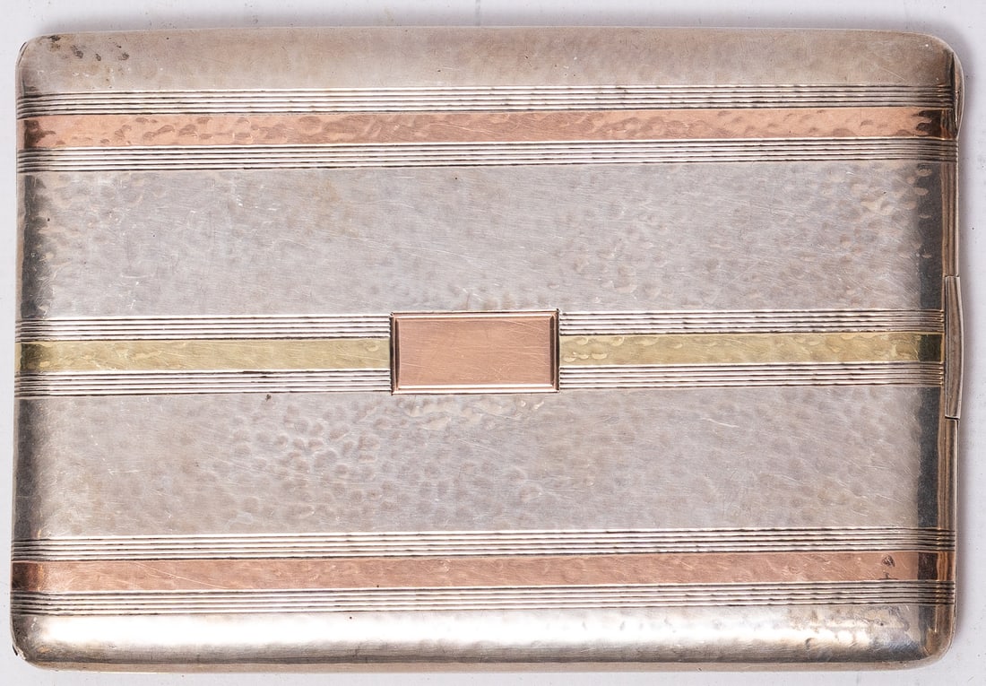 Vintage Sterling & 14k Gold Cigarette Case: Early 20th century, American A sterling silver and 14k gold cigarette case. Marked inside on arm with a "ST" hallmark and "sterling and 14k 641". Dimensions 11.8 x 8 cm (4 2/3 x 3 1/8 inches) Total we