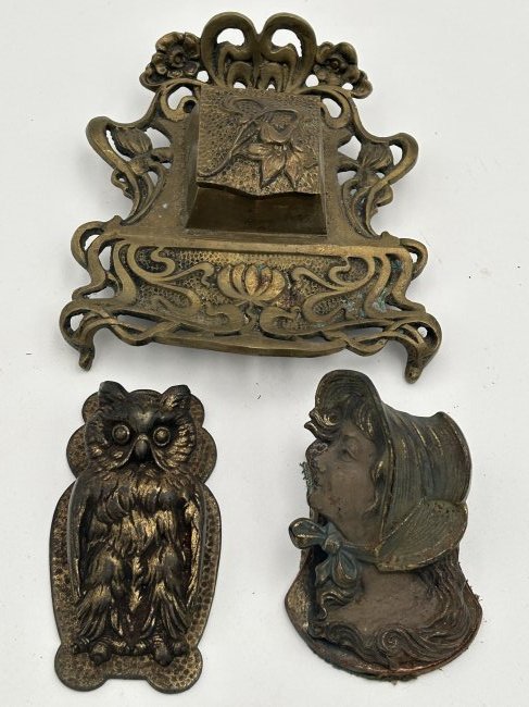 pair of brass Desk Clips and inkwell: Early 20th century, with a pair of figural owl and maiden desk clips, as well as Nouveau inkwell. ***please note- measurement for inkwell***
