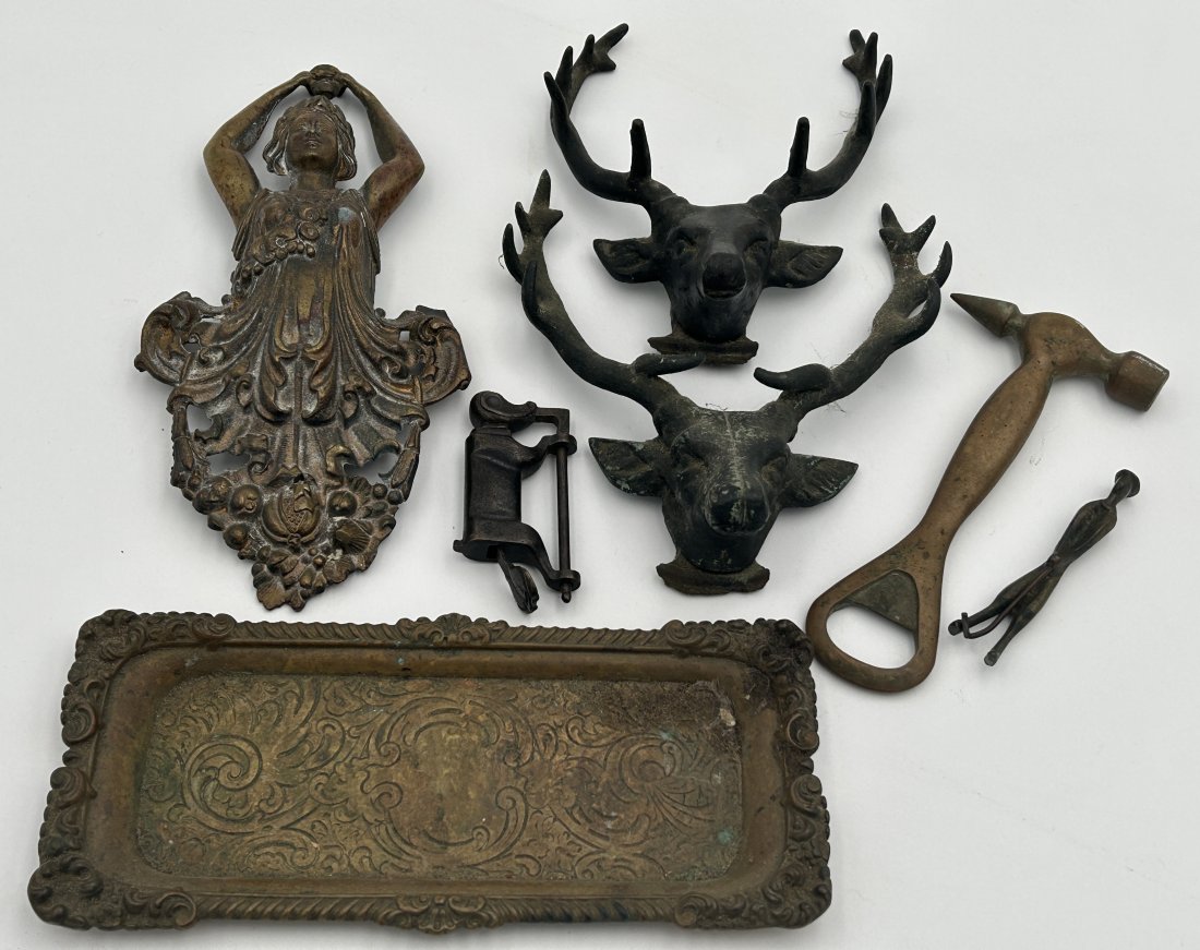 Decorative metal object lot- including antique Chinese monkey lock, tray, and deer heads: Includes:*antique brass figural monkey lock, likely Chinese*tray*figural deer head elements*bottle opener*small bronze figure*Nouveau ormolu figural maiden [likely furniture trim]