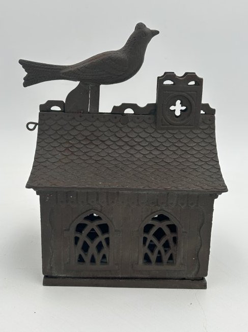 Antique circa 1878 J. E. Stevens 'Bird on Roof' Cast Iron Mechanical Bank: A very fine, working example of a RARE early Stevens mechanical bank, manufactured in 1878. Referred to as the 'Bird on Roof'- bird perched on the ridge of a building, which 'pecks' a penny into the s