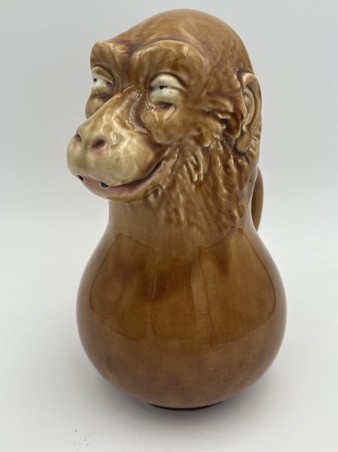 Antique Majolica Sarreguemines French Monkey Ceramic Pitcher: Circa 1890, produced by the Sarreguemines Potters of France. A charming figural monkey, with expressive face.